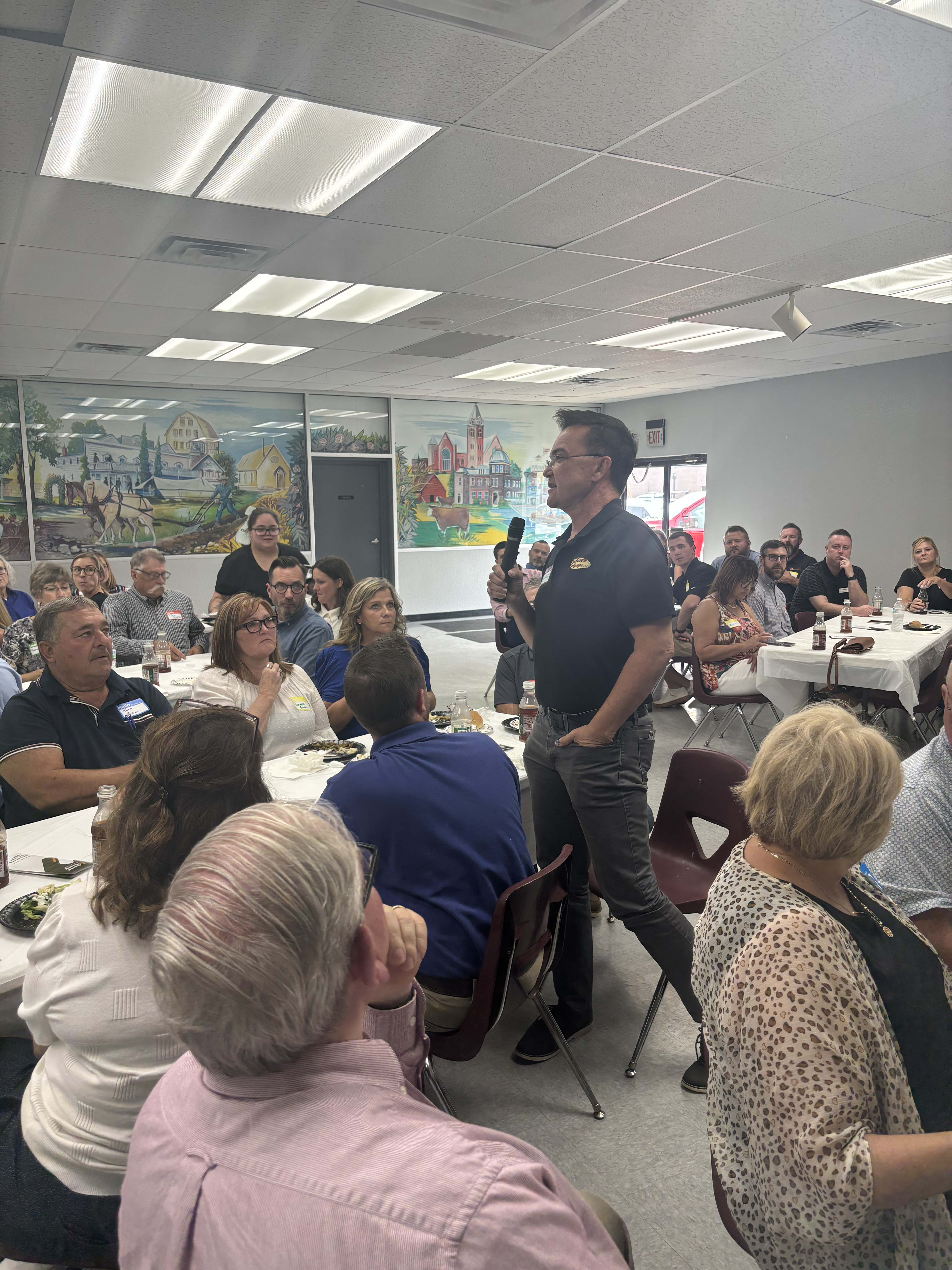 Andrew County residents listening to a local speaker